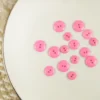 Bouton brillant polyester rose
