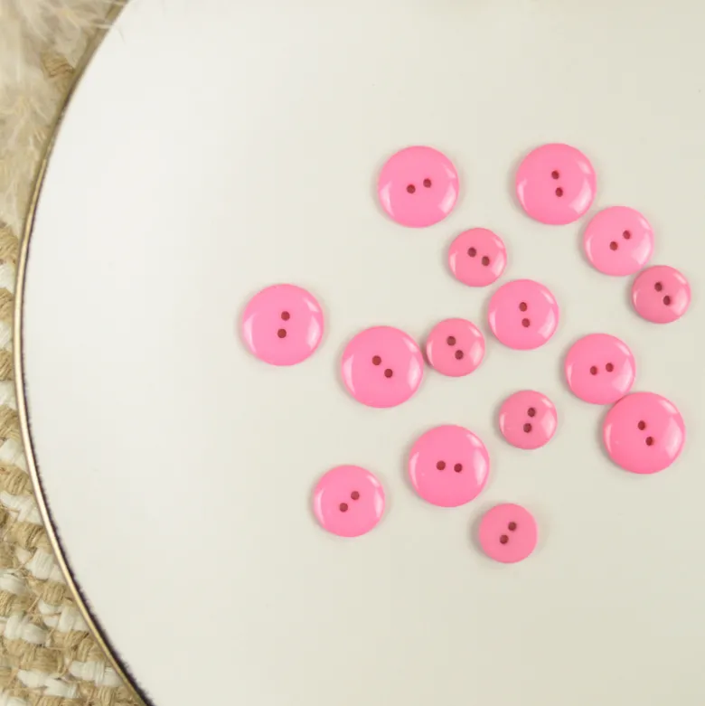 Bouton brillant polyester rose