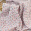 Double gaze de coton Bio, OEKO TEX Santina motifs fleurs pétrole et pointe de rose fluo