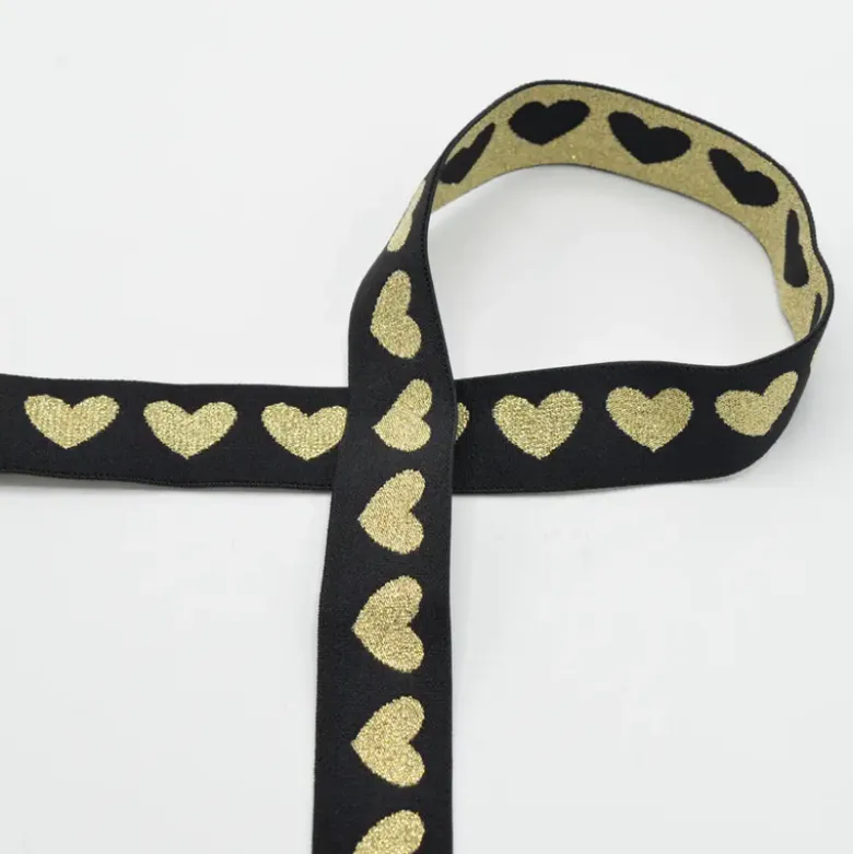 Elastique Lurex motif coeurs Doré fond noir 25mm