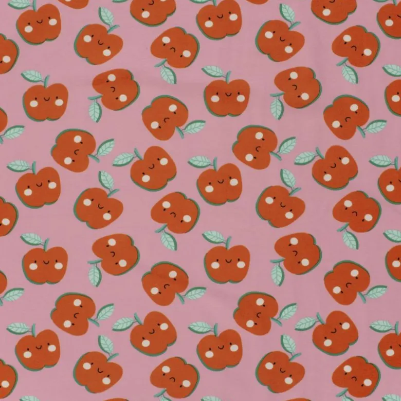 Jersey de coton motif pommes fond rose - OEKO TEX