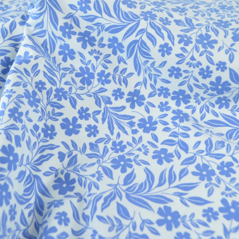 Jersey fleurs bleues fond blanc – Poppy Fabrics - OEKO TEX