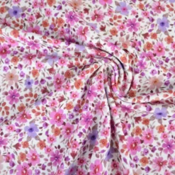 Jersey fleurs fuchsia et parme fond blanc cassé – Poppy Fabrics - OEKO TEX