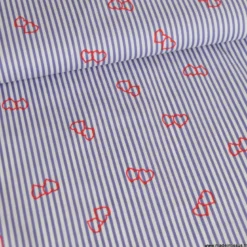 Popeline stretch à rayures motif coeurs