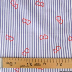 Popeline stretch à rayures motif coeurs