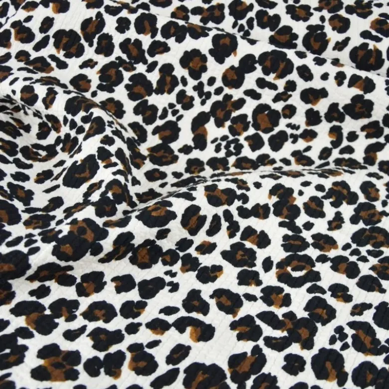 Seersucker surpiqué motif léopard sable et noir