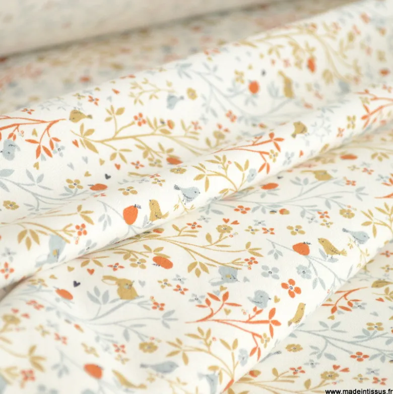 Sergé de coton Camilia motif fleurs, oiseaux et fruits fond blanc