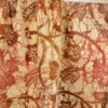 Tissu Batik artisanal "Savana" – fleurs cuivrées sur fond crème