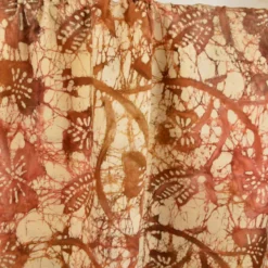 Tissu Batik artisanal "Savana" – fleurs cuivrées sur fond crème