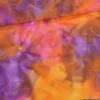 Tissu Batik marbré orange et violet