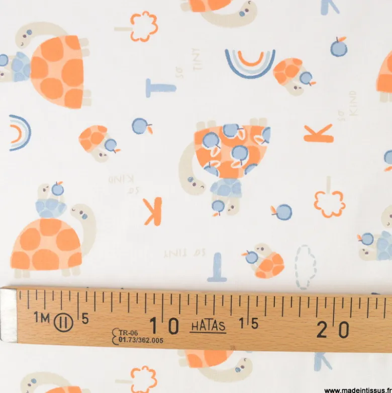 Tissu Coton Bekitou motif Tortues oranges fond blanc - OEKO TEX