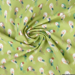Tissu coton Bio Djikene motifs Toucans fond guacamole -OEKO TEX