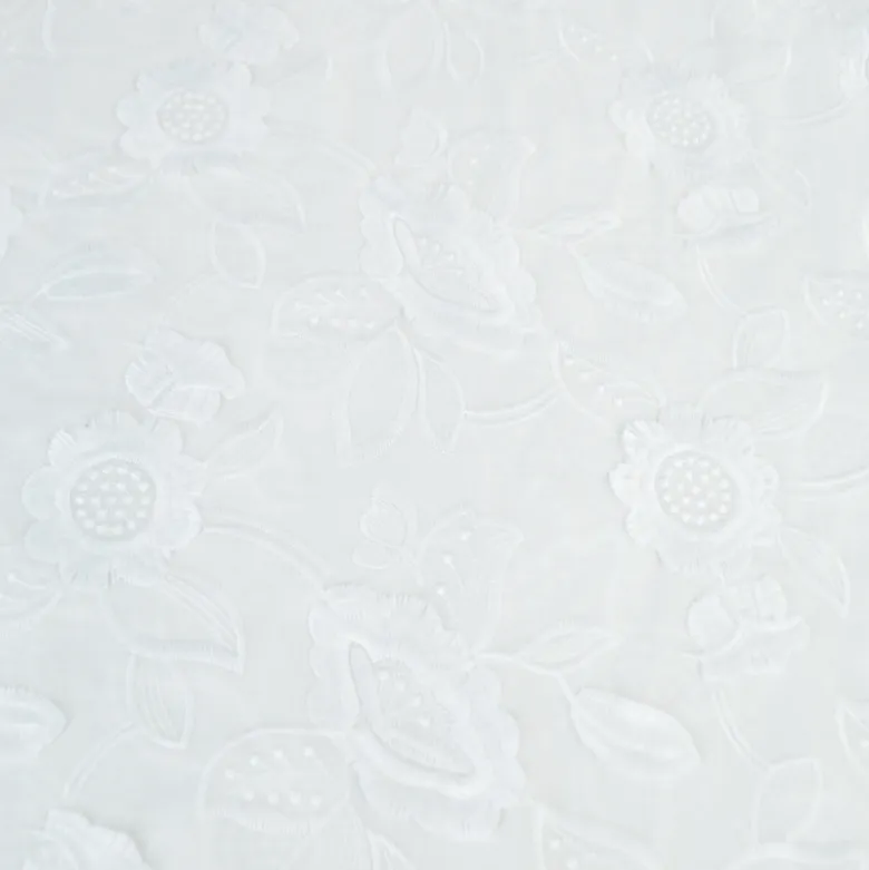 Tissu coton brodé blanc cassé à fleurs frangées