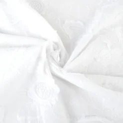 Tissu coton brodé blanc à fleurs frangées