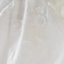 Tissu coton brodé blanc à fleurs frangées