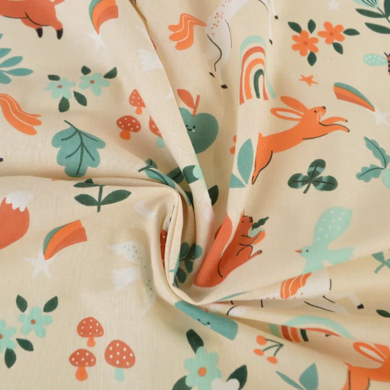 Tissu coton Cassiopée - Motif animaux et licornes fond Crème