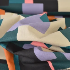 Tissu coton demi-natté imprimé géométrique multicolore