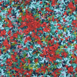 Tissu coton enduit Capucine motif fleurs rouges