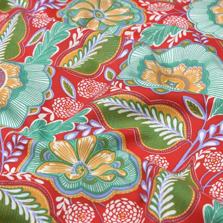 Tissu coton enduit Esther motif fleuri fond rouge