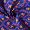 Tissu coton enduit fleurs graphiques rose – Fond bleu - Poppy
