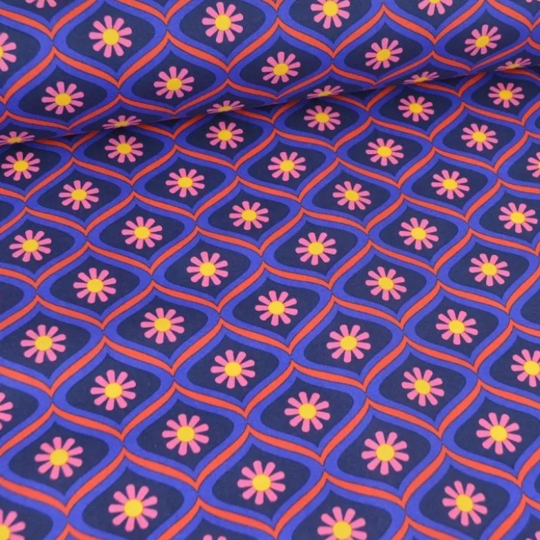 Tissu coton enduit fleurs graphiques rose – Fond bleu - Poppy