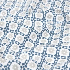 Tissu coton enduit Geline graphique et fleurs bleu et gris