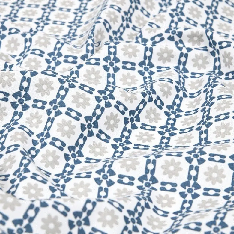 Tissu coton enduit Geline graphique et fleurs bleu et gris