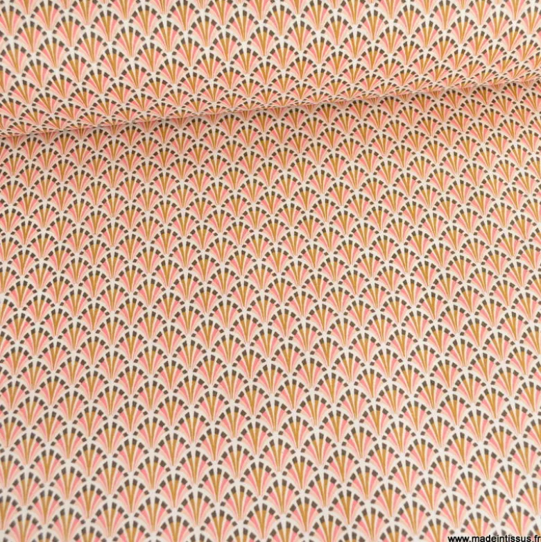 Tissu coton Enduit Kolius motif écailles Sorbet et blanc