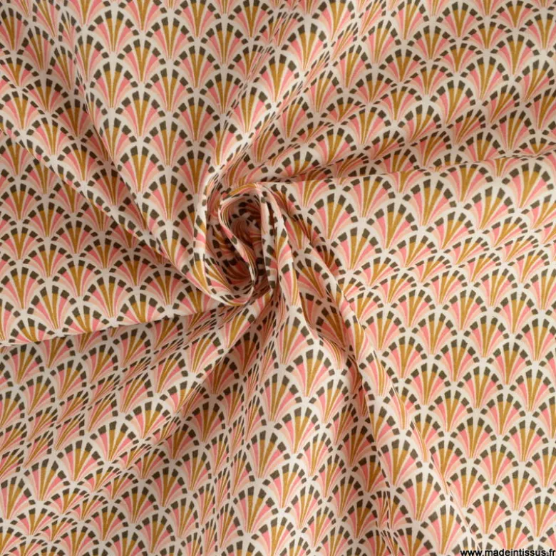 Tissu coton Enduit Kolius motif écailles Sorbet et blanc