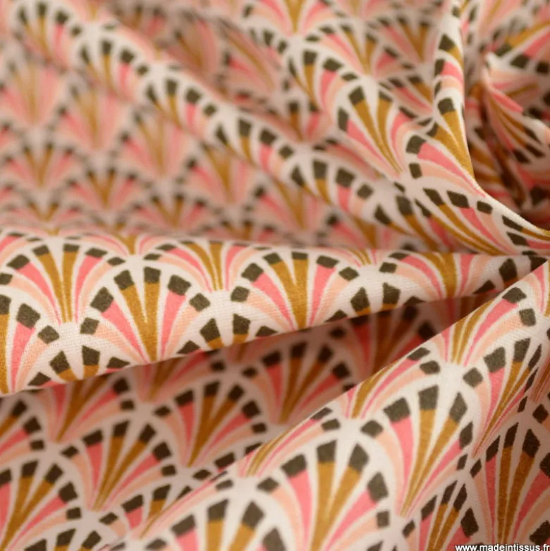 Tissu coton Enduit Kolius motif écailles Sorbet et blanc
