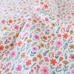 Tissu coton Enduit Maddy fleurs roses fond écru