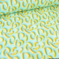 Tissu coton enduit motif bananes 3D – Fond vert menthe