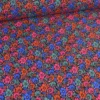 Tissu coton enduit petites fleurs vintage bleues et rouge - Poppy