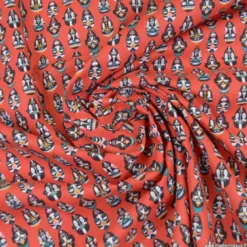 Tissu coton imprimé masques Africains fond Rouge - OEKO TEX