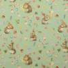 Tissu coton lapins et oeufs de Pâques fond vert