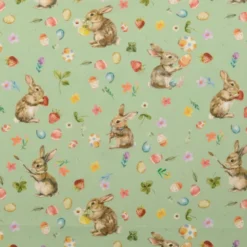 Tissu coton lapins et oeufs de Pâques fond vert
