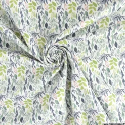 Tissu coton Lion motif petites feuilles exotiques vertes fond blanc