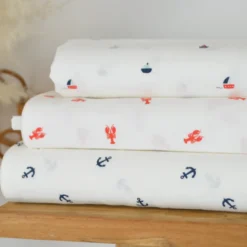 Tissu coton motif bateaux fond blanc cassé - OEKO TEX