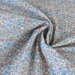 Tissu coton Natura motif petites fleurs vertes, corail et bleu