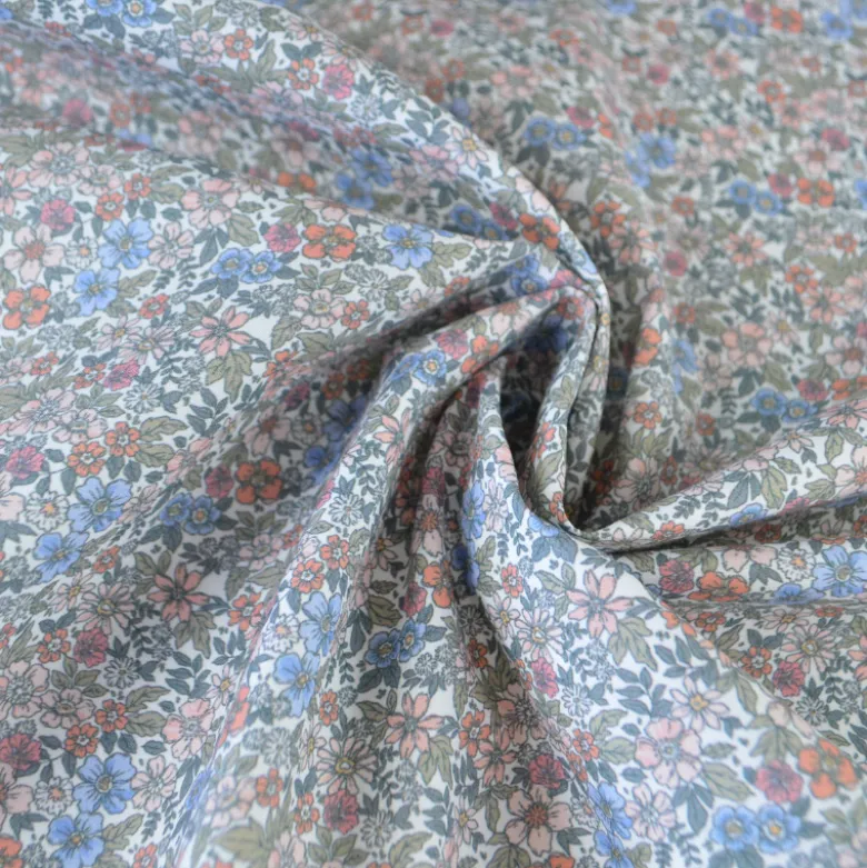 Tissu coton Natura motif petites fleurs vertes, corail et bleu