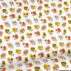 Tissu coton Pablo motifs visages fond blanc - OEKO TEX