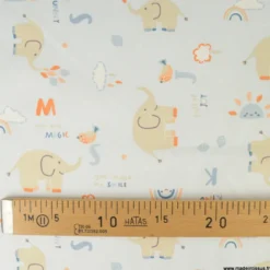 Tissu Coton Padao motif éléphants et arcs en ciel fond bleu clair - OEKO TEX