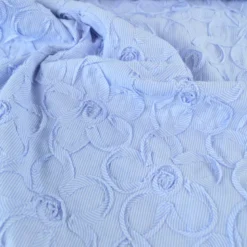 Tissu coton à ratyures Octave motif fleurs en relief