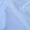 Tissu coton à rayures fines irisées bleus et blanches
