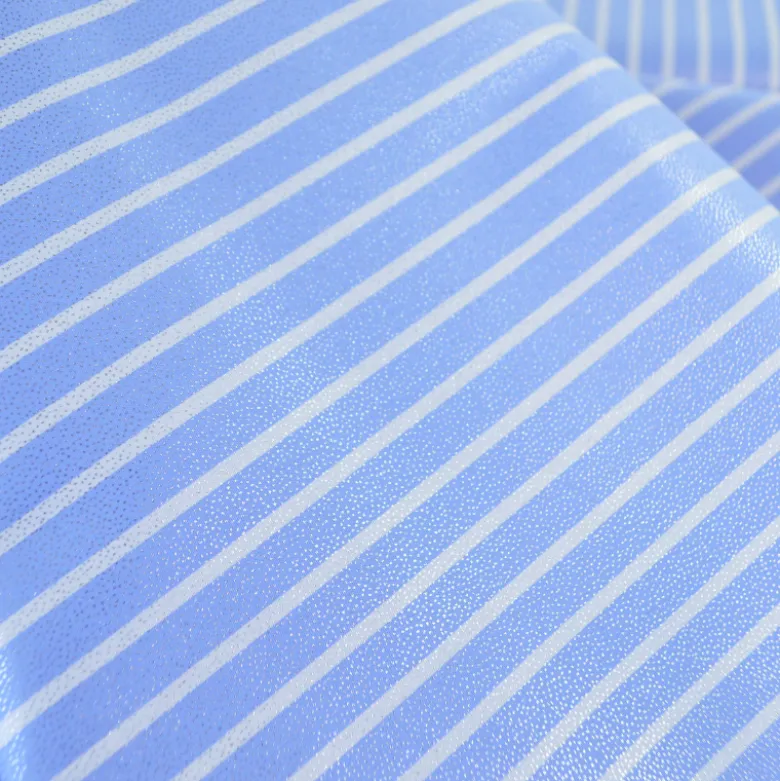 Tissu coton à rayures larges irisées bleus et blanches