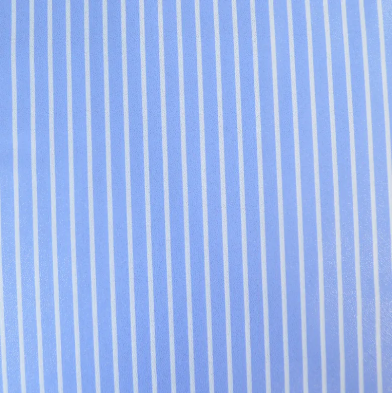 Tissu coton à rayures larges irisées bleus et blanches