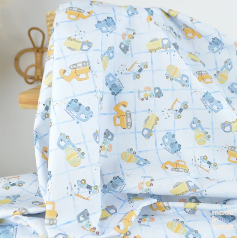 Tissu cretonne coton Cammy motif camions de chantier fond bleu