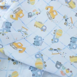 Tissu cretonne coton Cammy motif camions de chantier fond bleu