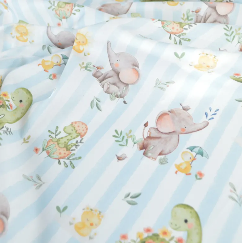 Tissu cretonne coton Ellie motif dinosaures et éléphants -OEKO TEX