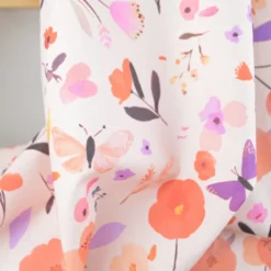 Tissu cretonne coton Fisalia motif fleurs rouges fond pêche - OEKO TEX